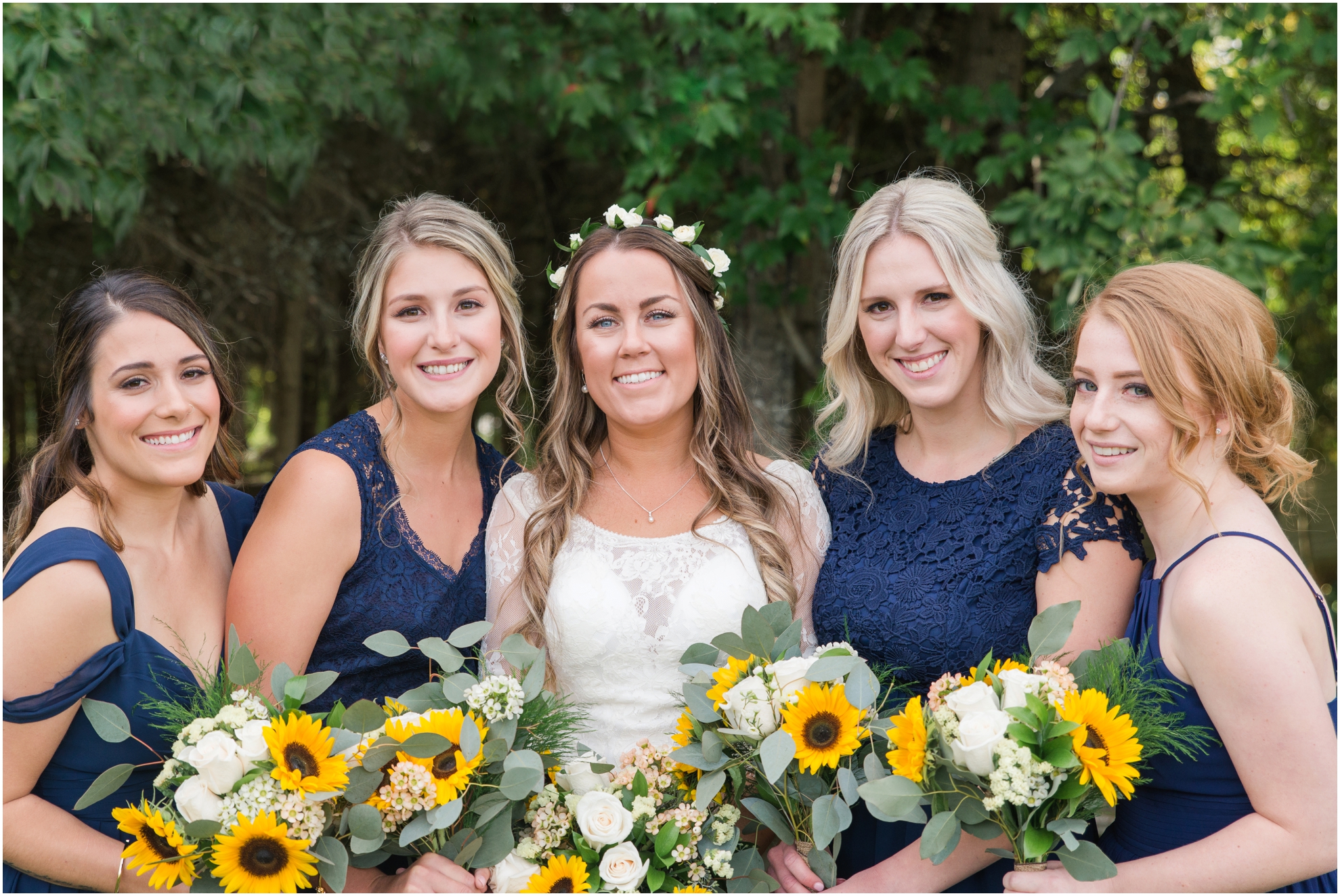 navy bridesmaid dresses, sunflower bouquets